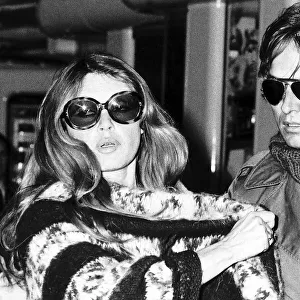 Brigitte Bardot actress with her lover sculptor Miroslav Brozak at Heathrow airport Dbase