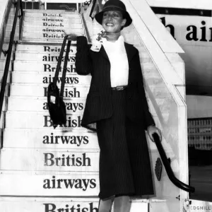 British Airways stewardesses show off a classic and elegant new uniform designed by top