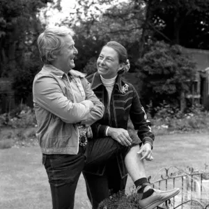 British comedian Ernie Wise showing off his fat hairy legs to his wife. June 1980