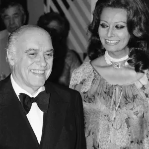 Carlo Ponti and Sophia Loren attend a dinner at the Sporting Casino, Monte Carlo