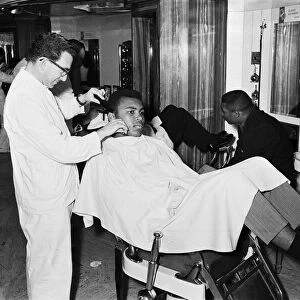 Cassius Clay aka (Muhammad Ali) getting shave in London'