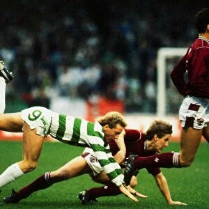 Celtic versus Hearts Premier League football Frank McAvennie tumbles after