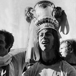 Charlie George footballer for Arsenal with the FA cup trophy after Arsenal beat Liverpool