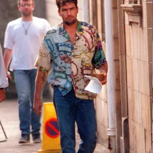 Charlie Sheen actor filming July 1997, at Clydebank Town Hall near Glasgow with cup of