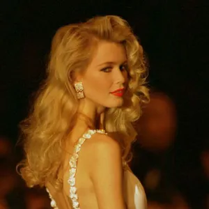 Claudia Schiffer Supermodel models a white dress by Valentino designer for the Paris