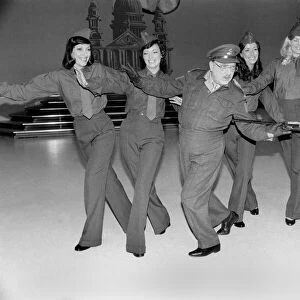 Comedy actor Arthur Lowe of Dads Army dancing with girls