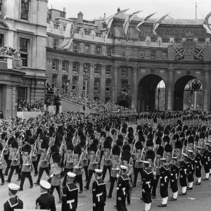 Five Companies of Foot Guards part of Her Majesty Procession make their way through