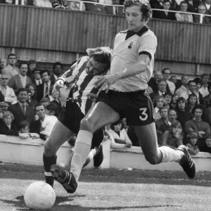 Coventry Citys left-back Chris Cattlin in a tackle with Sounthampton'