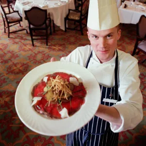 Crathorne Hall Hotel chef Phillip Pomfret standing in one of the many dining rooms at