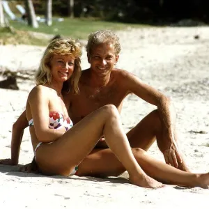 Cricketer David Gower cricketer with girlfriend Thorrun Nash on the beach during their