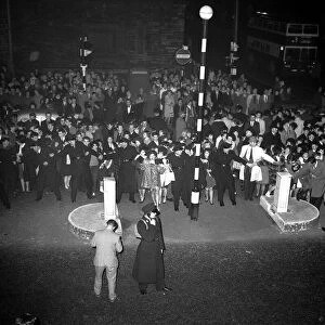Crowds of fans in the streets of Belfast hahead of the Beatles performance at the Ritz