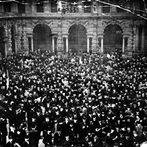 Crowds gather at the Liverpool Cotton Exchange. Circa 1910