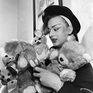 Culture club lead singer boy George with his cuddly toys he has saved from his fans
