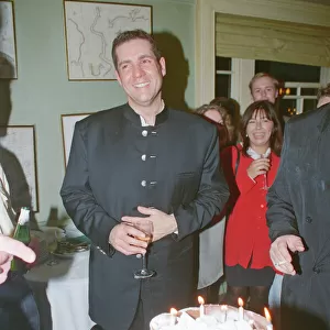 Dale Winton with his cake and friends at his birthday party in 1996