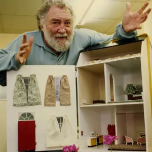 David Bellamy inspects the energy efficient dolls house on show at the Newcastle Energy