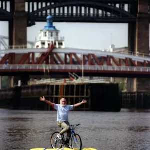 David Bellamy tries out the shuttle bike to cross the River Tyne in Newcastle on 11th May