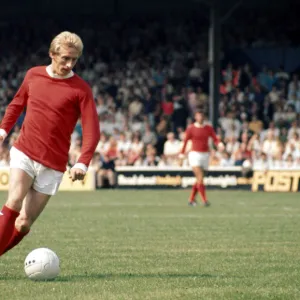 Denis Law in action for Manchester United during their English League Division One match