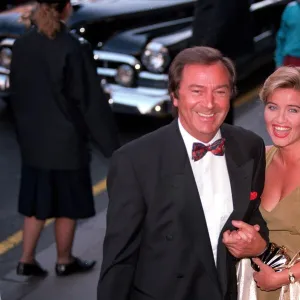 DES O CONNOR AND HIS GIRLFRIEND JAY RUFER ARRIVING AT THE PREMIERE OF SUNSET