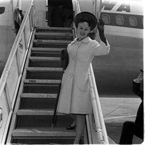 Dorothy Provine actress waves from aircraft steps June 1962