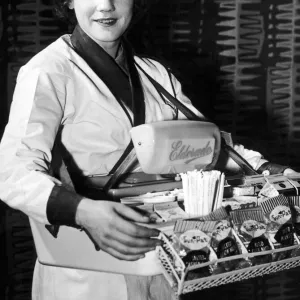 Dorothy Smith, Usher selling ice cream and cigarettes at local cinema, Glasgow, Scotland