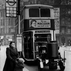 A double decker bus with a fuel trailer attached - March 1943 London Transport try