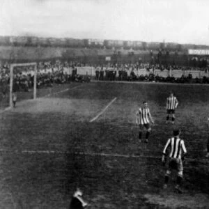 An early picture of Ninian Park taken from Sloper Road with the popular bank