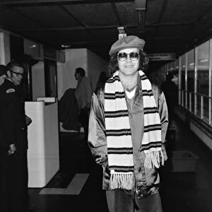 Elton John at Heathrow airport before flying to Moscow for a concert tour. 20th May 1979