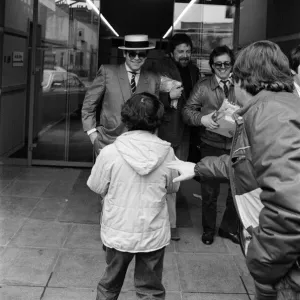 Elton John leaving the TV-am studios. 4th April 1983