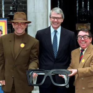 ELTON JOHN, PRIME MINISTER JOHN MAJOR AND RONNIE CORBETT IN PHOTOCALL FOR SPECTACLES