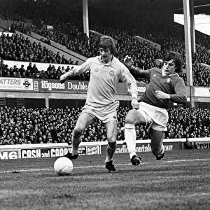 Everton V Leeds. Leeds attack. Allan Clarkes steers the ball past a determined challege