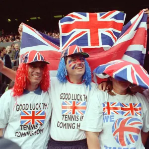 Fans of Tim Henman support the English tennis player during his Fourth Round Match of