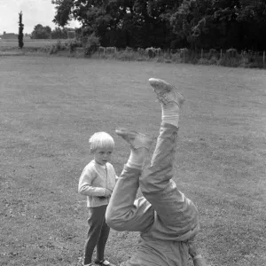 Footballer Bobby Tambling with wife and baby. 25th June 1966