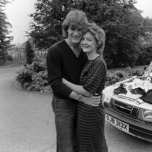 Footballer Glenn Hoddle with wife Ann and new car 1982 a Saab 900 turbo amongst