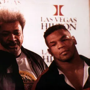 Frank Bruno Mike Tyson boxers with promotor Don King at a press conference