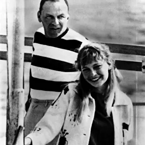 Frank Sinatra with Mia Farrow on a boat