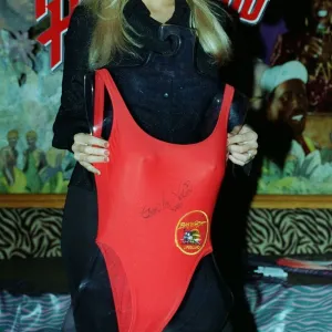 Gena Lee Nolin Actress Star of Baywatch at Planet Hollywood in london with the red