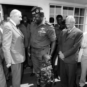 General Idi Amin introduces his son to Foreign Secetary James Callaghan