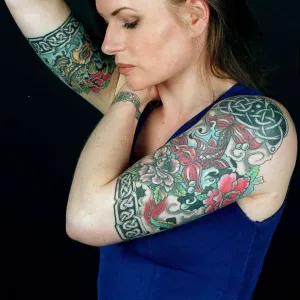 Girl with coloured tattoos on her arms. April 1996