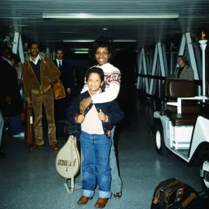 Gladys Knight with her son Shanga and some of her road crew at London Airport