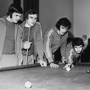 Glasgow Rangers players relaxing playing a game of snooker (L-R) Derek Johnstone