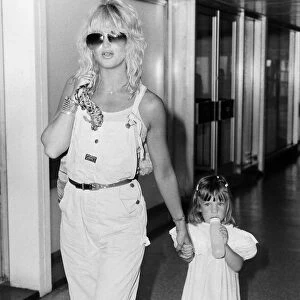 Goldie Hawn, American actress with daughter Kate, aged 3 years old