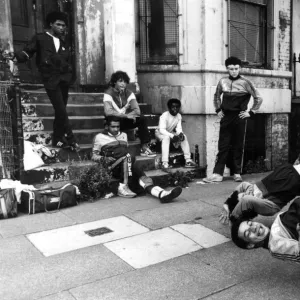 A group of breakdancers, the Eastwood Rockers, going through their break dancing paces