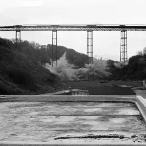 The Half Penny Bridge, Saltburn, North Yorkshire, being blown up. 17th December 1974