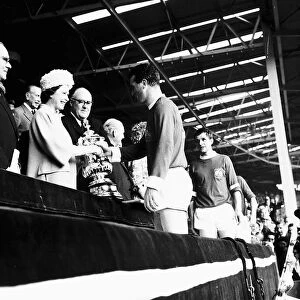 HRH Queen Elizabeth II presenting the FA cup to Noel Cantwell