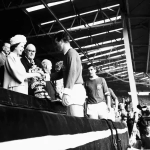 HRH Queen Elizabeth II presenting the FA cup to Noel Cantwell