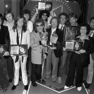 Ian Dury with other winning recipients Robin Gibb, Leo Sayer, Nick Lowe