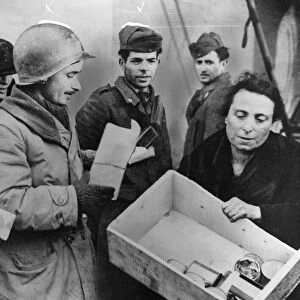 Italian civilians get food from Allies. Italian civilians in the Nettuno beachhead area