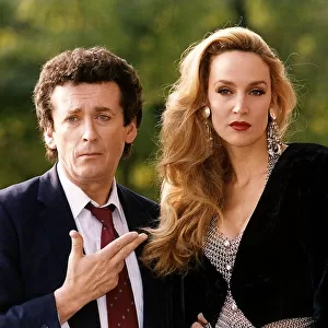Jasper Carrott with Jerry Hall and Robert Powell in the comedy series "