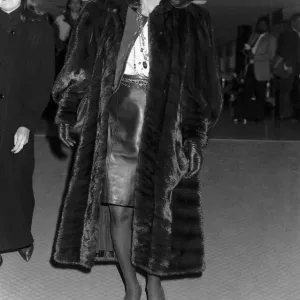 Joan Collins actress starred in Dynasty arrives at Heathrow. November 1988