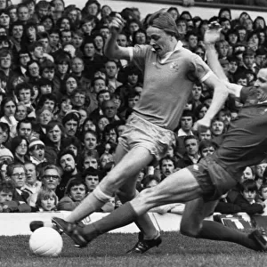 Joey Jones of Liverpool slides in to tackle Peter Barnes of Manchester City during